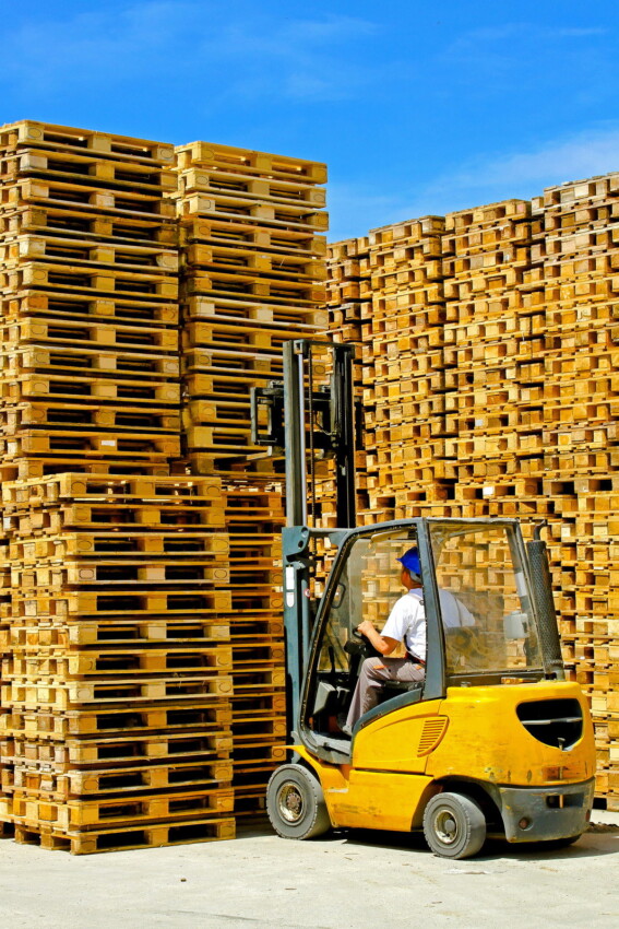 forklift next to pallets