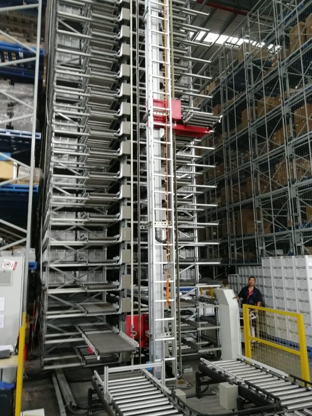 storage stacker crane next to the racks